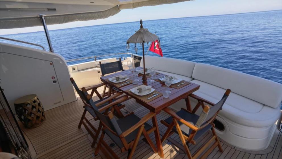 Dining and relaxing area at the stern of the yacht
